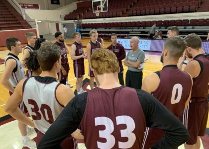 Bellarmine basketball head coach meets with team