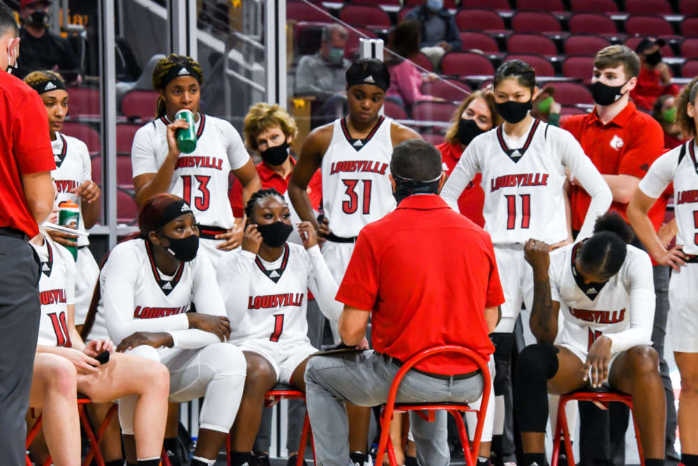Louisville women's basketball huddle