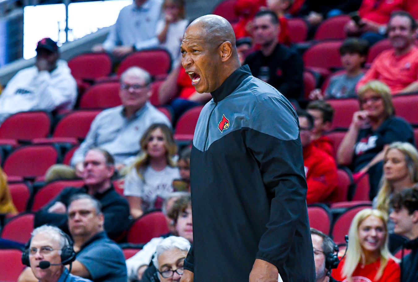 Campus stroll a reminder of basketball coach Kenny Payne's U of L ties