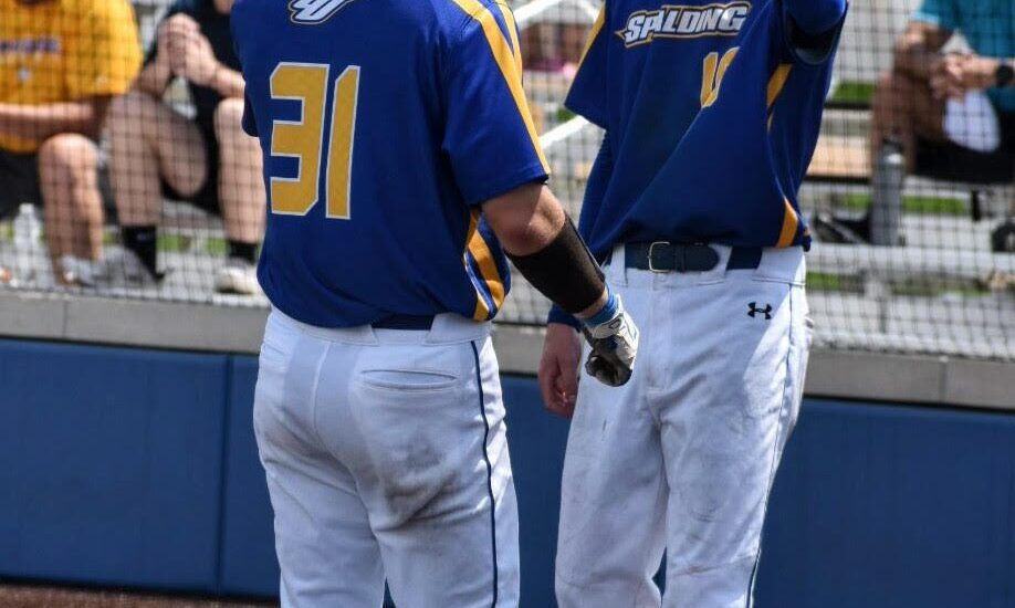 Jacob Spanyer of Spalding University celebrates a big play at the plate.