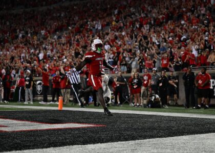 Louisville football running back Isaac Brown celebrates after scoring a 4th quarter touchdown against James Madison on September 5th, 2025.