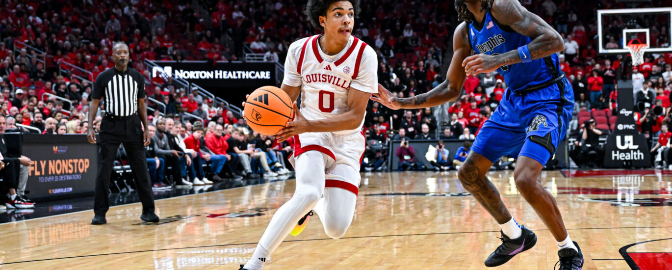 Mikel Brown Jr. drives to the basket in Louisville basketball win over Memphis.