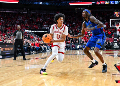 Mikel Brown Jr. drives to the basket in Louisville basketball win over Memphis.
