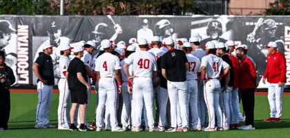 The Cards Huddle vs Kentucky 4/21/26 Photo by Jared Anderson